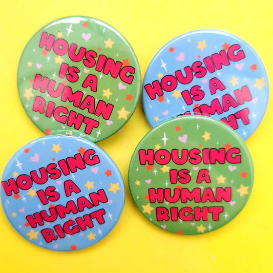 Housing Is A Human Right badge